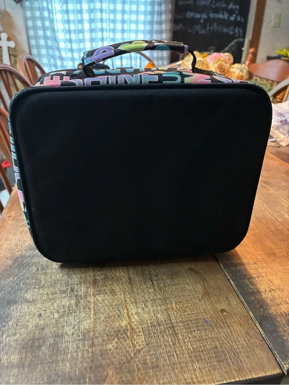 Justice Black lunch bag with Pastel Rainbow Text